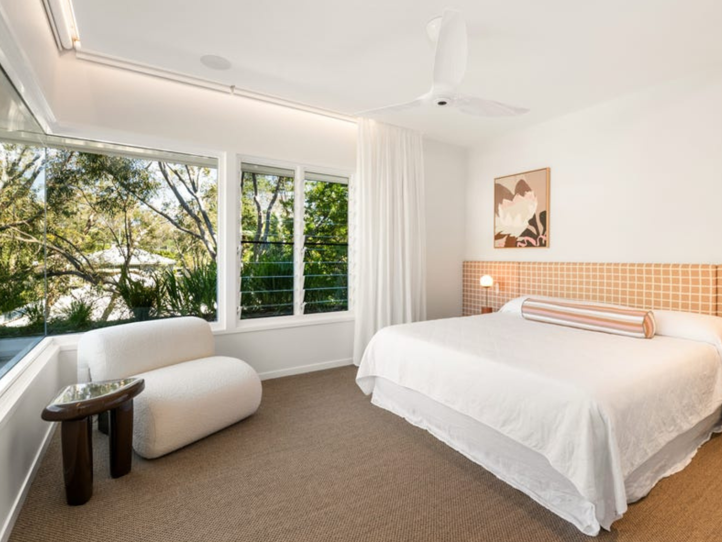 Bedroom styled with neutral abstract artwork for hire in Bardon House