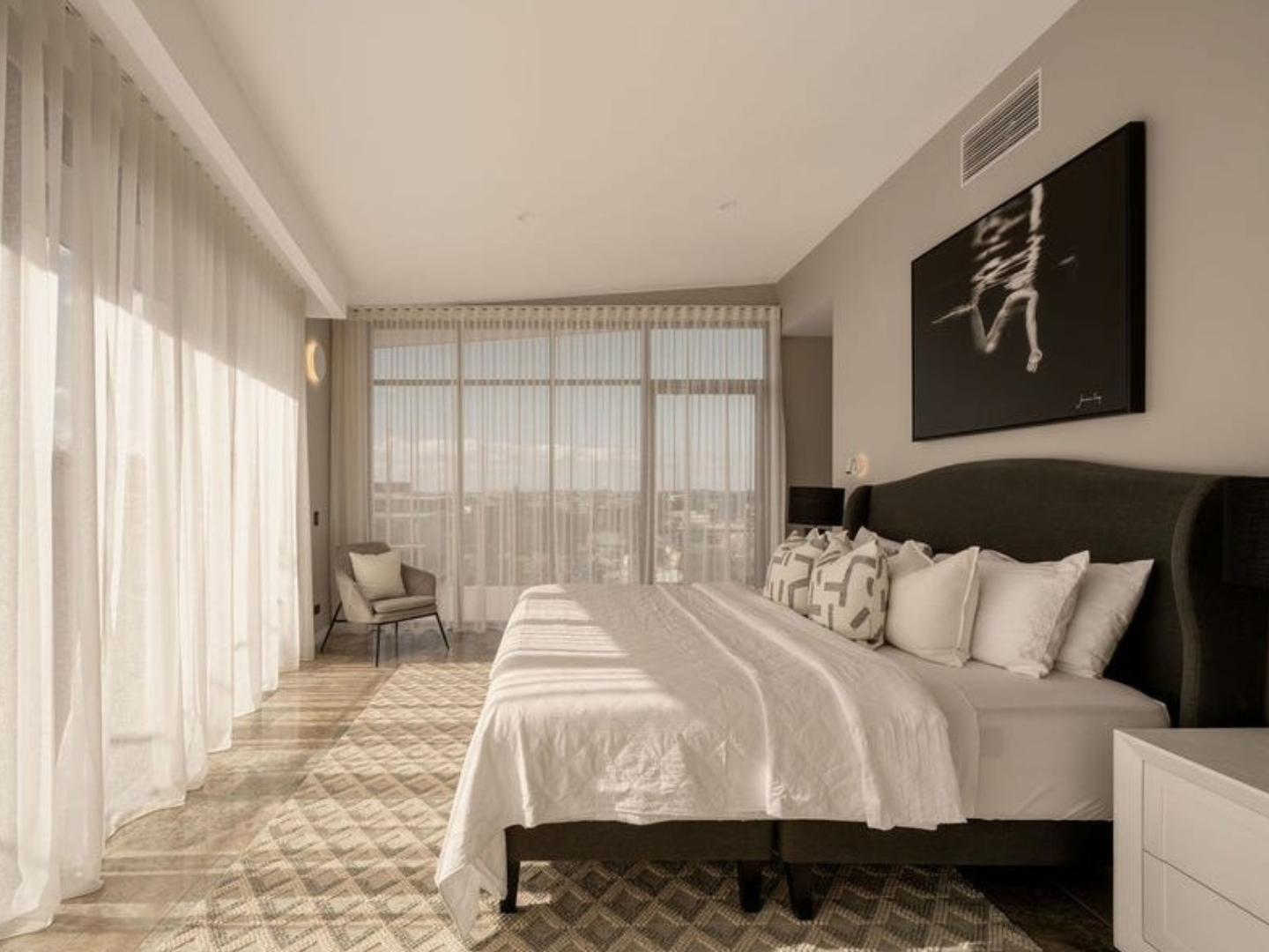 Bedroom styled with nFrancesca Owen  artwork for hire in Brisbane penthouse apartment