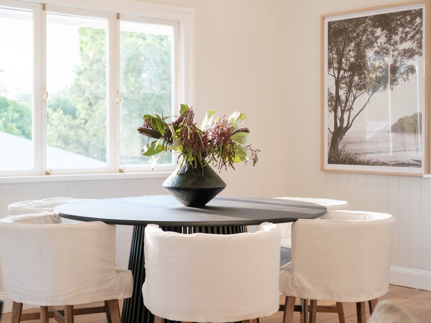 Dining space featuring curated artwork for hire in Sandgate Brisbane property styling project