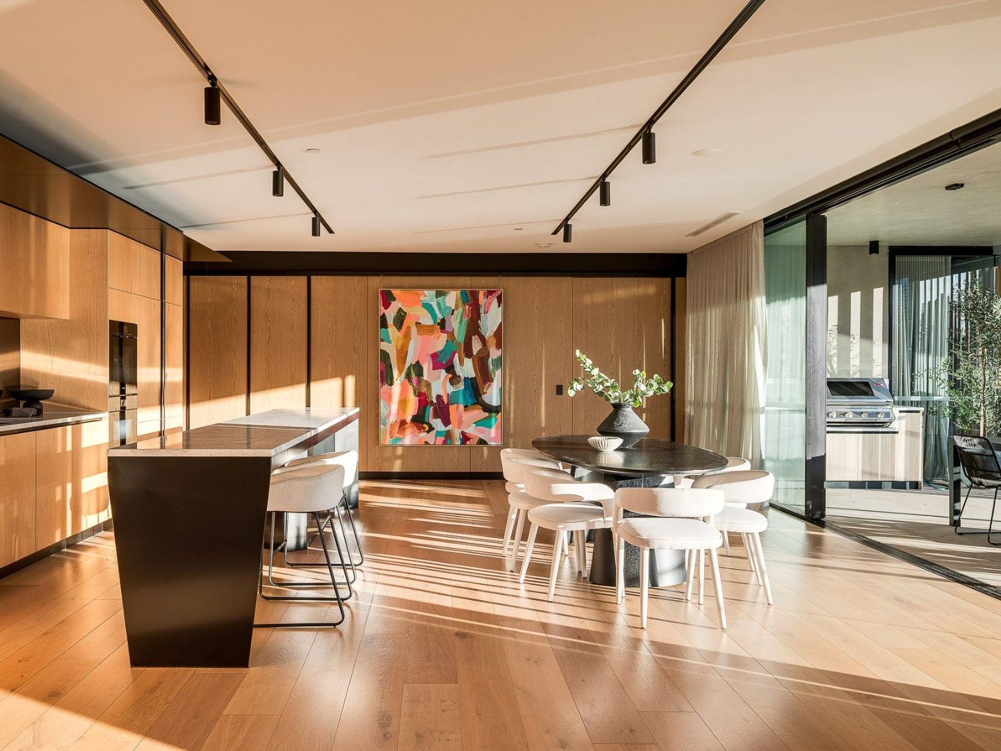 Dining space featuring curated artwork for hire in Kangaroo Point Brisbane property styling project