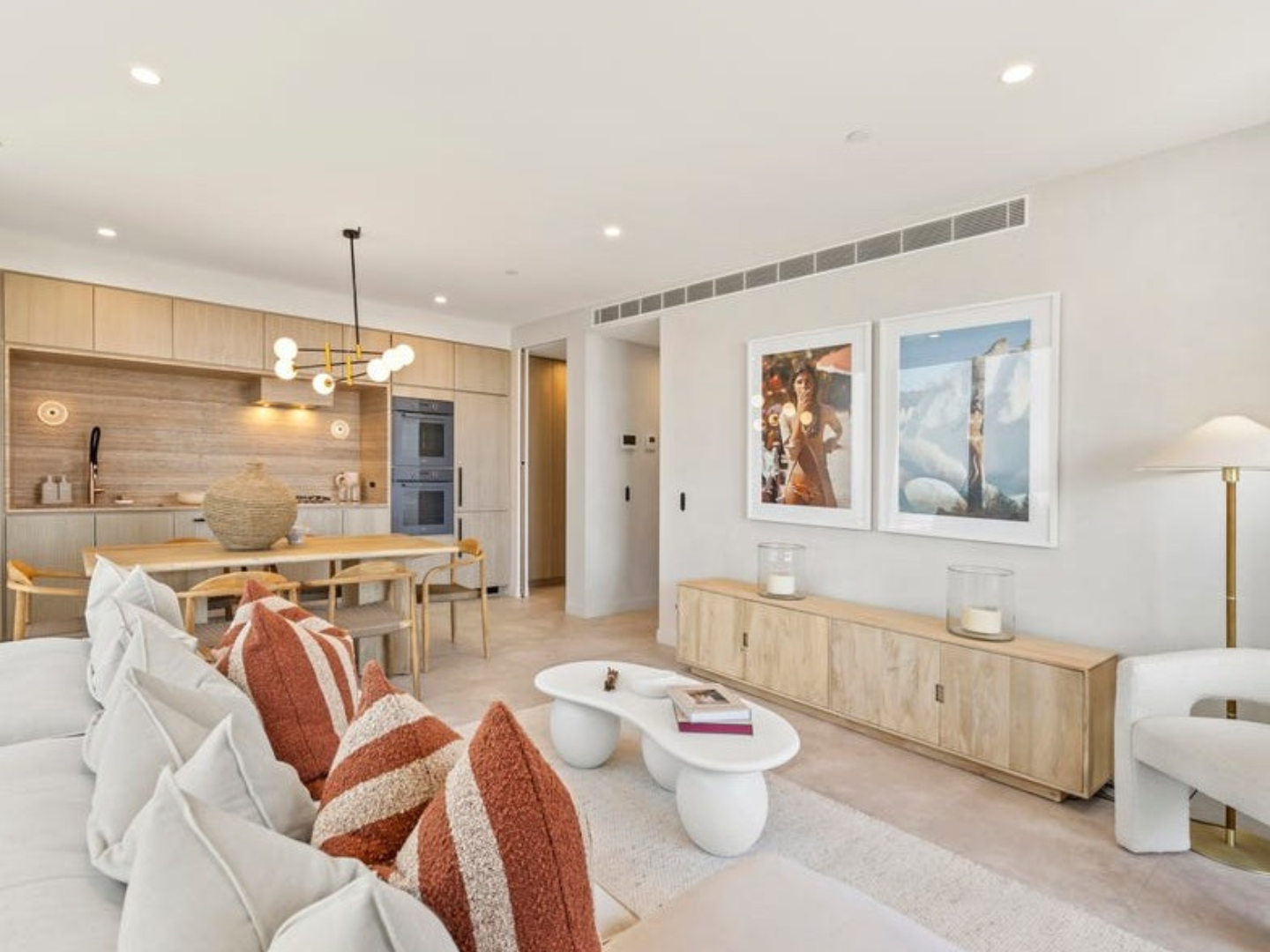 Living room styled with Alim Aarons contemporary artwork for hire in Mondrian Resdences Burleigh Heads apartment