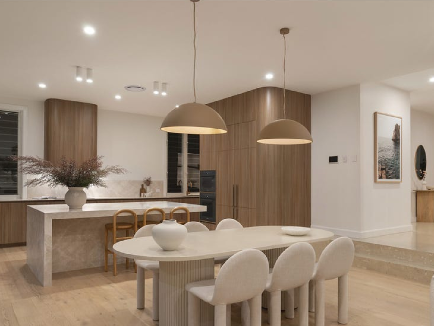 Dining space featuring curated artwork for hire in Wavell Heights property styling project